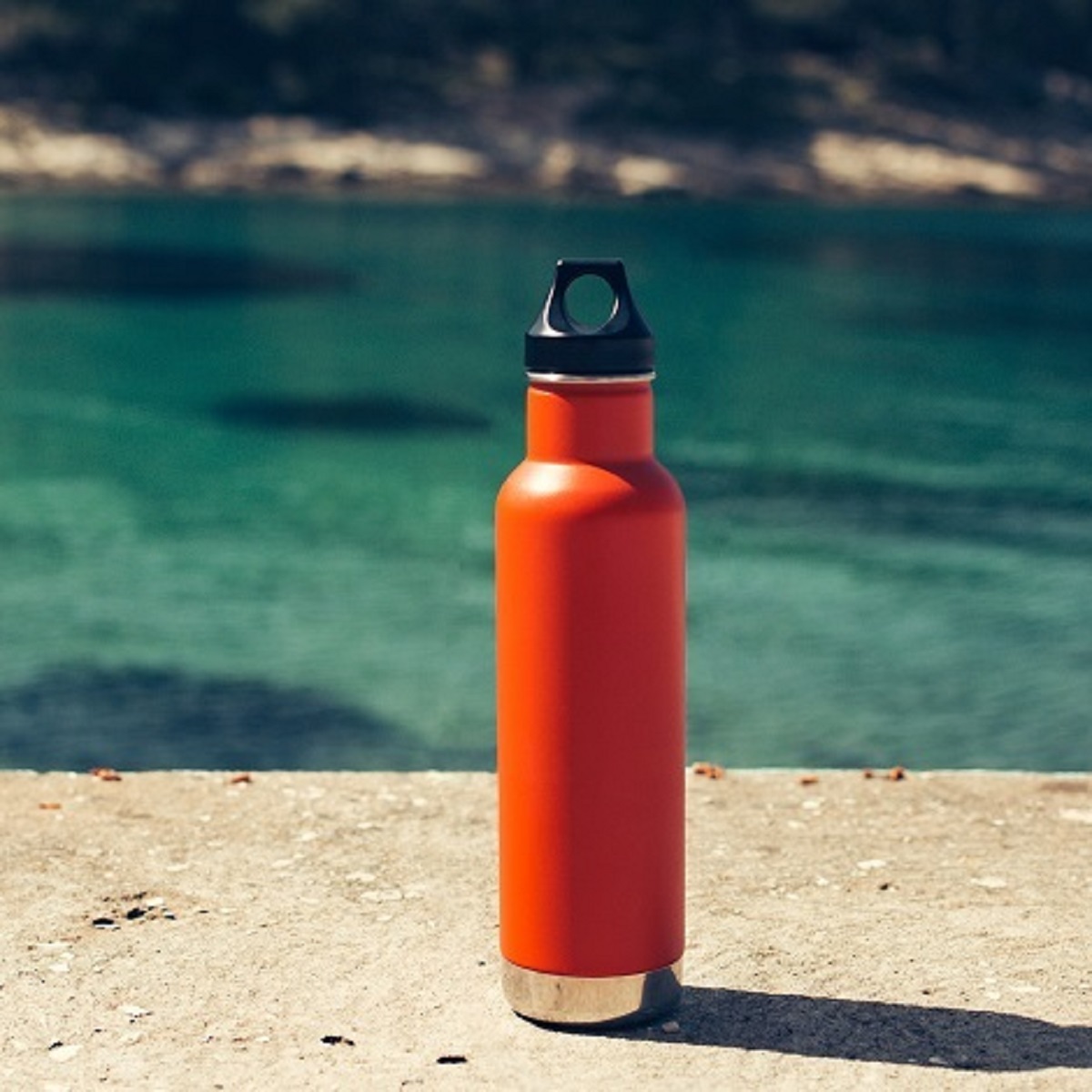 A reusable orange waterbottle