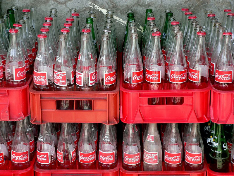 Coke Trims Exec Comp Plan Amid Outcry