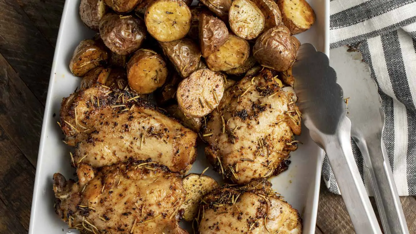 rosemary-baked-chicken-with-potatoes-1376x774.webp