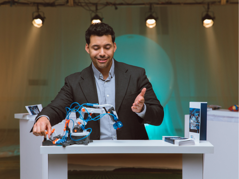 man using robotic arm display