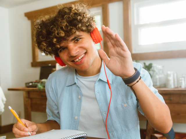 Student waving Student waving