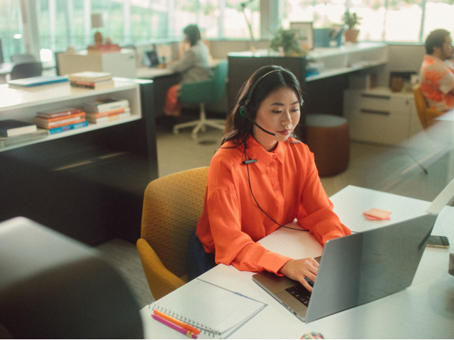 Woman working in office at desk